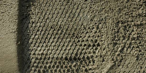 Mortar is applied on the metal lath.
